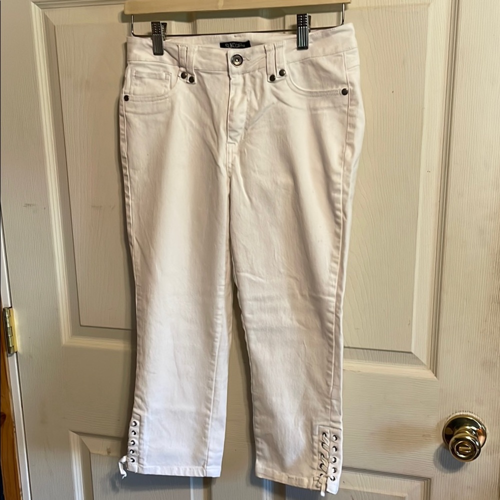 Stylish White Capris with Unique Hem Details